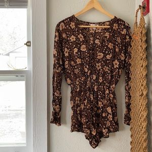 Floral long sleeved romper